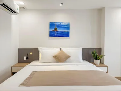 Habitación Queen con balcón — CityHouse NEST LightHouse Saigon